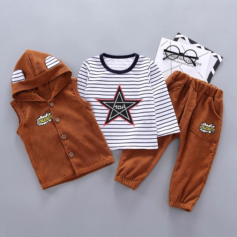 Children's clothing set with brown vest, striped shirt, and pants on a gray background