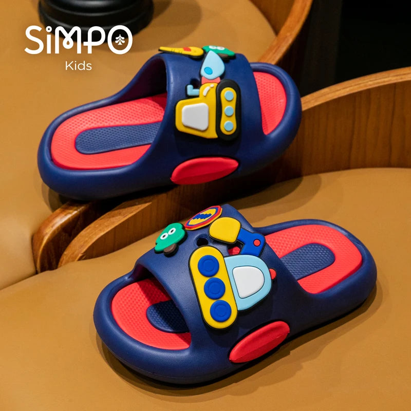 Colorful children's sandals with cartoon design on a wooden surface, featuring the brand 'Simpo'.