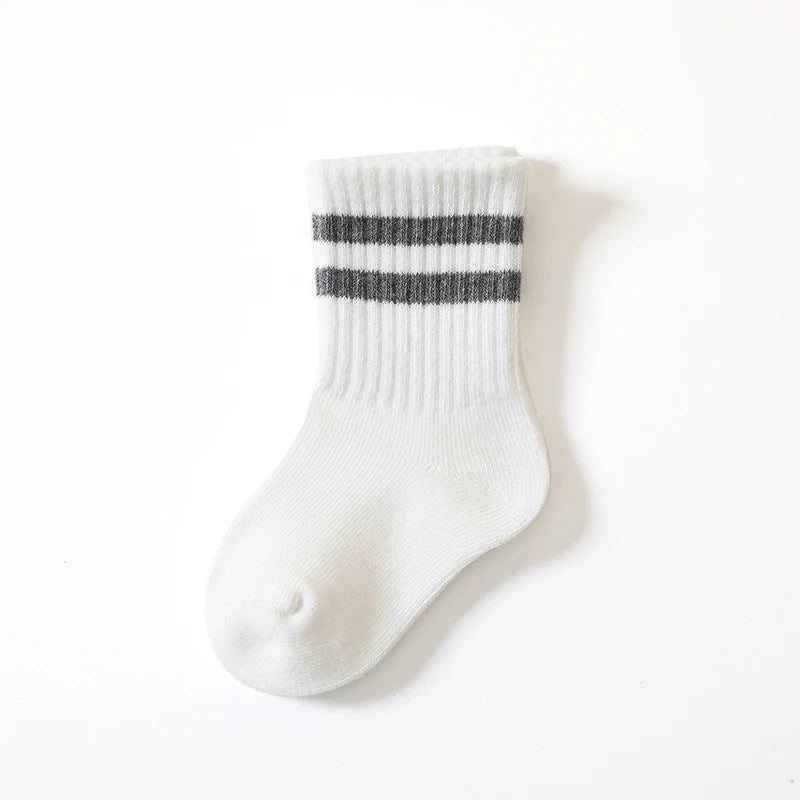 White sock with two black stripes on a white background