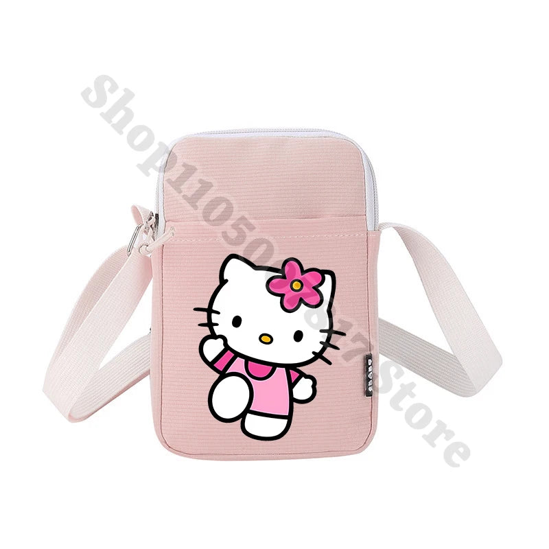 Pink crossbody bag with Hello Kitty design on a white background