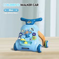 Blue children's walker car on a wooden surface with a light blue curtain background
