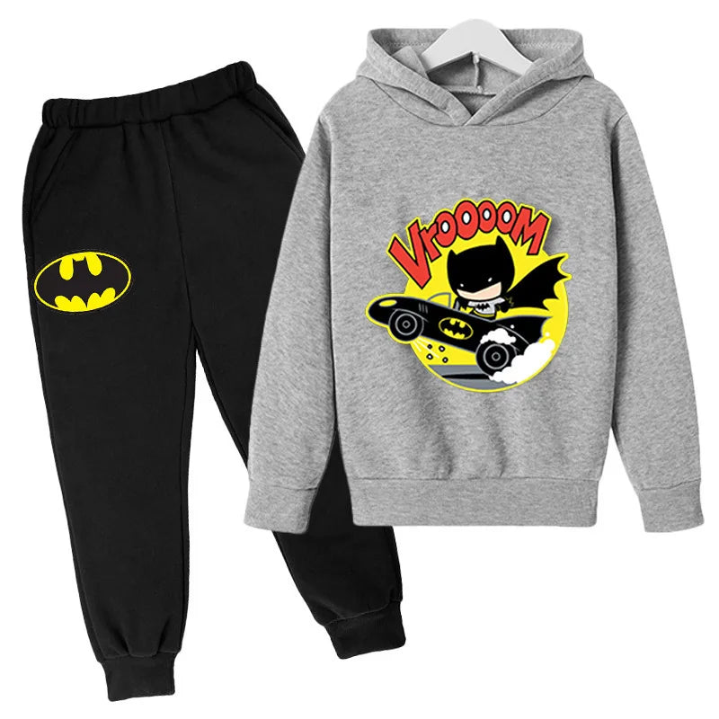 Gray hoodie with Batman graphic and black pants with Batman logo on a white background