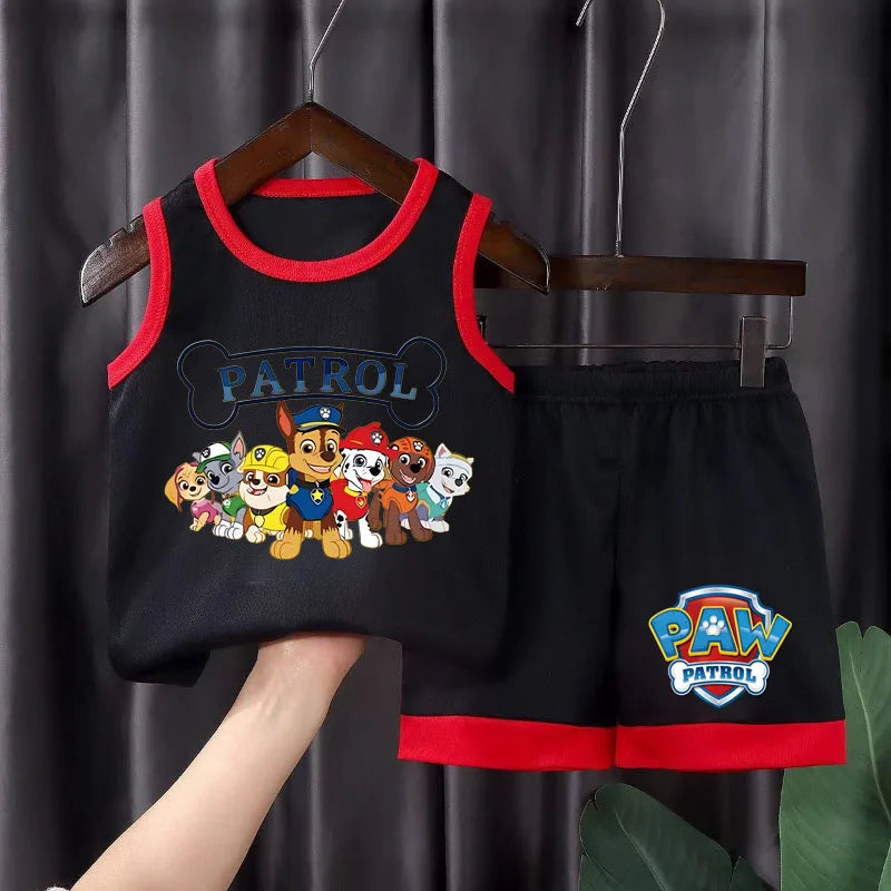 Children's black sleeveless top and shorts set with Paw Patrol graphics on a hanger against a dark background.
