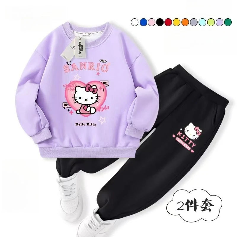 Children's outfit with lavender sweatshirt and black pants featuring Sanrio character on a white background.