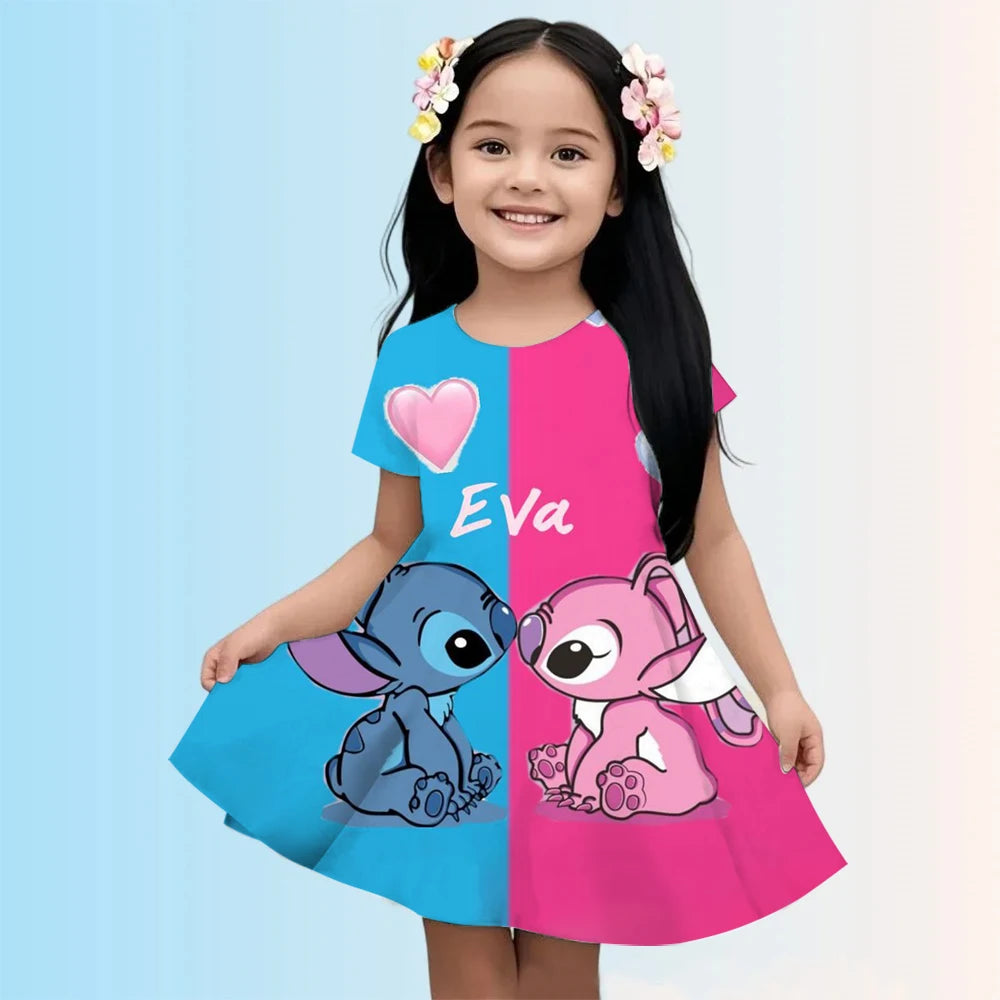 Child wearing a colorful dress with cartoon characters on a light blue background