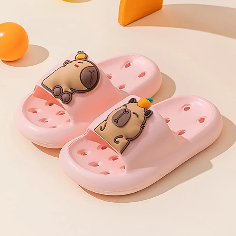 Pink slides with cartoon bear faces on a beige background