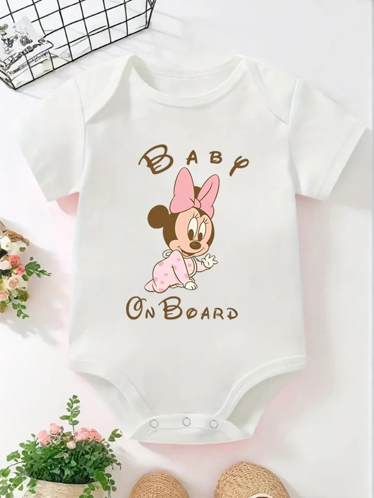 Baby onesie with cartoon character and 'Baby On Board' text on a white background