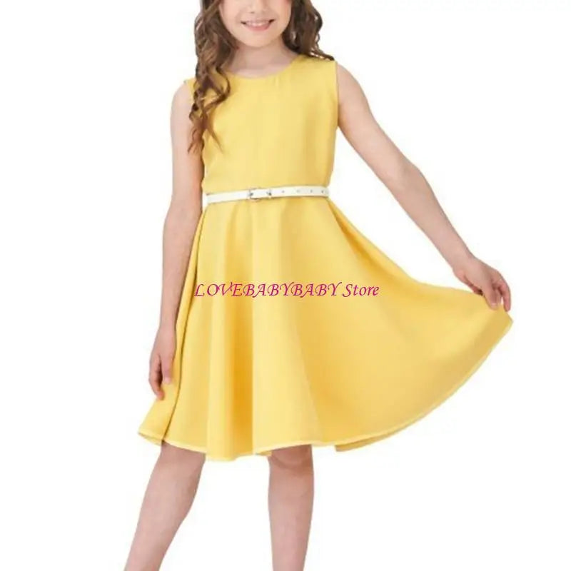 Young girl wearing a yellow dress with a white belt on a white background, branded 'LOVEBABYBABY Store'.