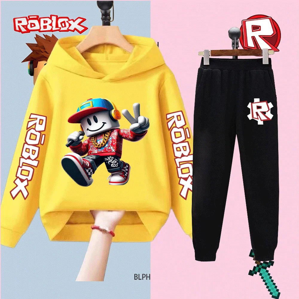 Yellow hoodie with Roblox character and black pants with Roblox logo on a split background.