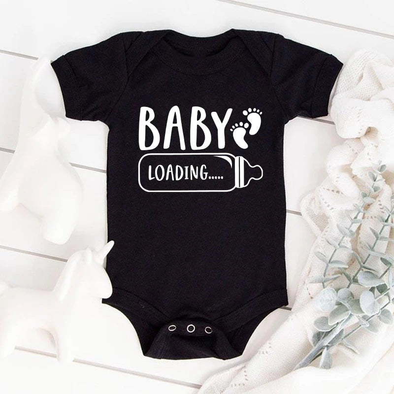 Black baby onesie with 'Baby Loading' text on a white background