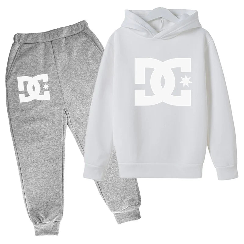 Gray sweatpants and white hoodie with DC logo on a white background