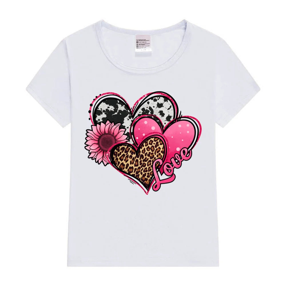 White t-shirt with a colorful heart design featuring flowers and leopard print on a white background