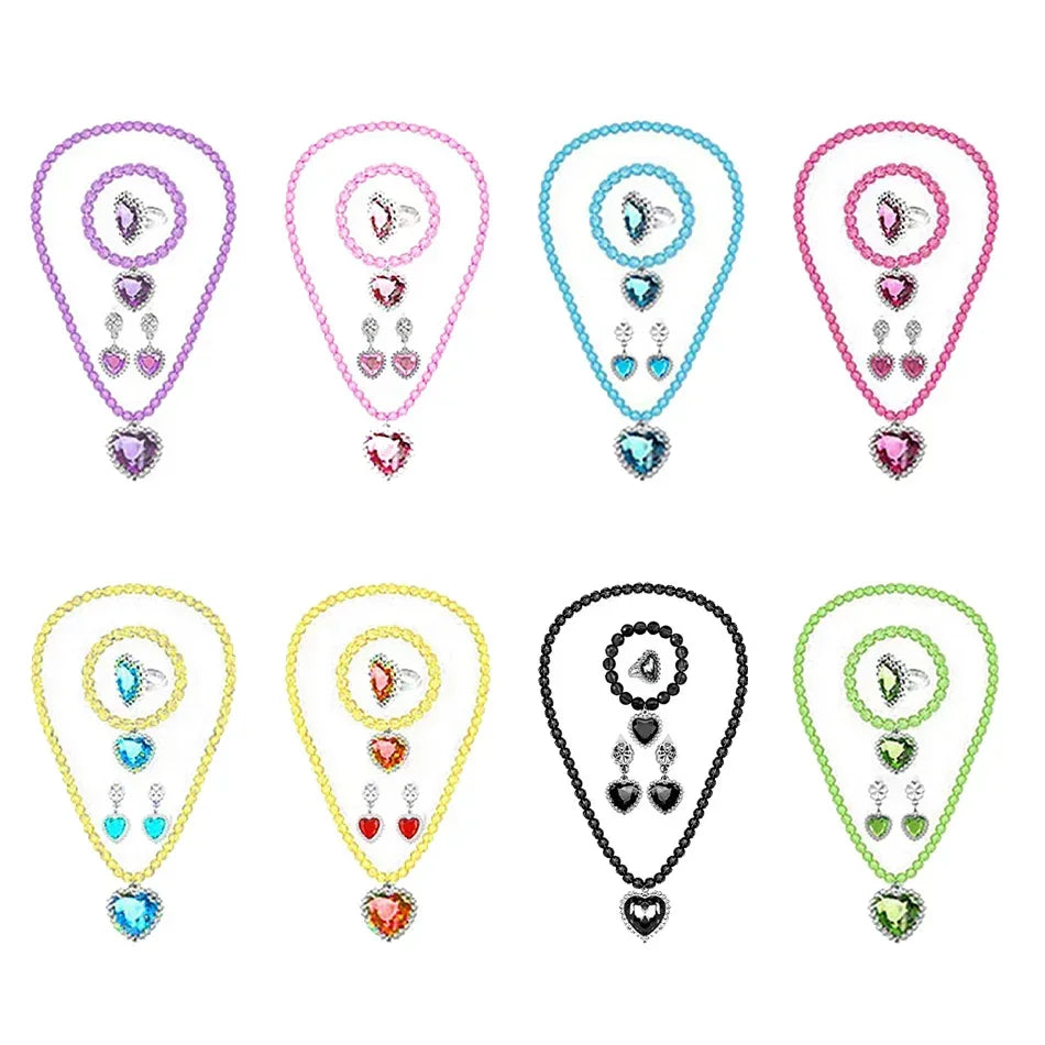 Set of colorful necklaces and earrings on white background