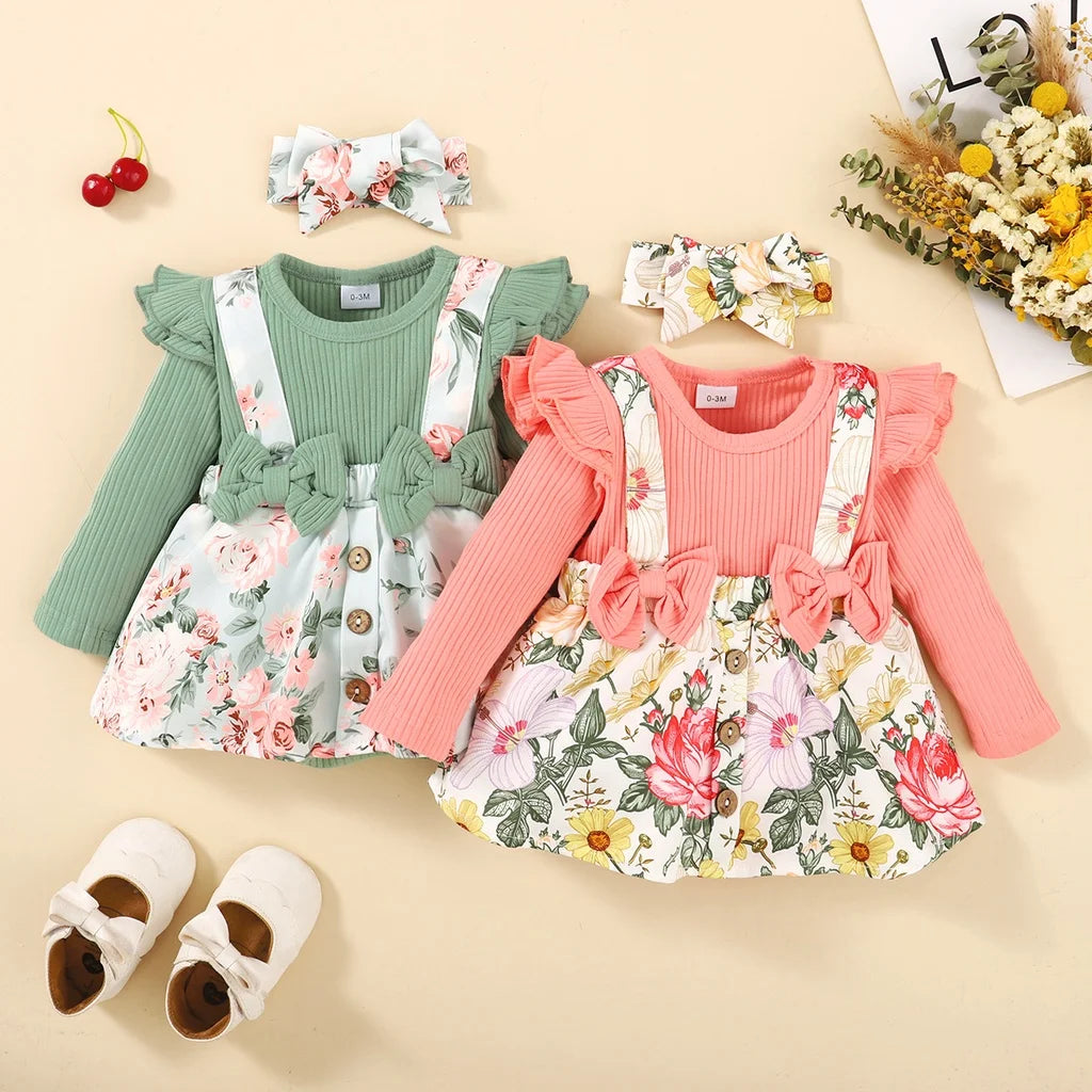 Two children's outfits with floral patterns, green and pink tops, and matching skirts on a beige background.