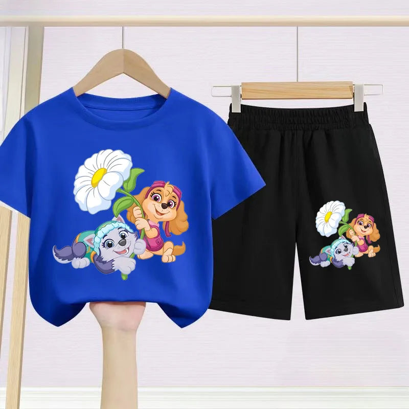Blue t-shirt and black shorts with cartoon characters on hangers against a white background