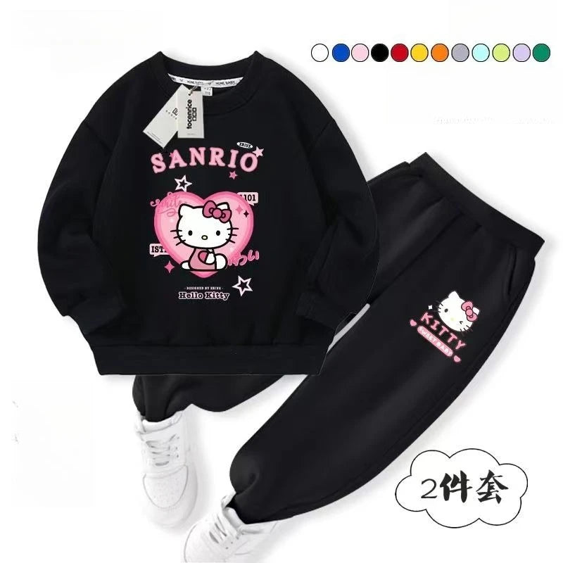 Black Sanrio-themed sweatshirt and pants set with Hello Kitty design on a white background.