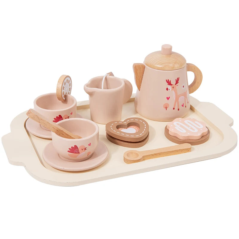 Wooden toy tea set with cups, saucers, teapot, and cookies on a tray with a white background.