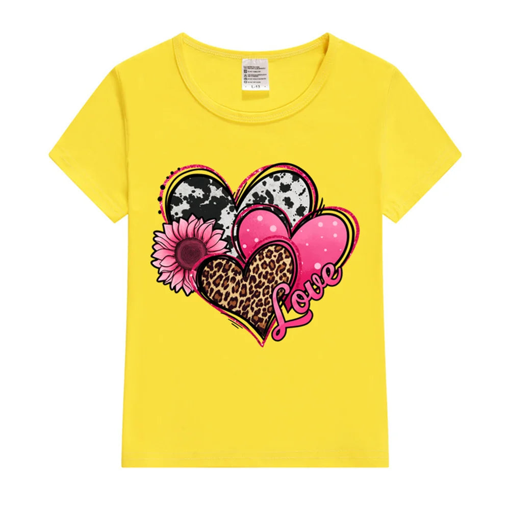 Yellow t-shirt with a colorful heart design on a white background