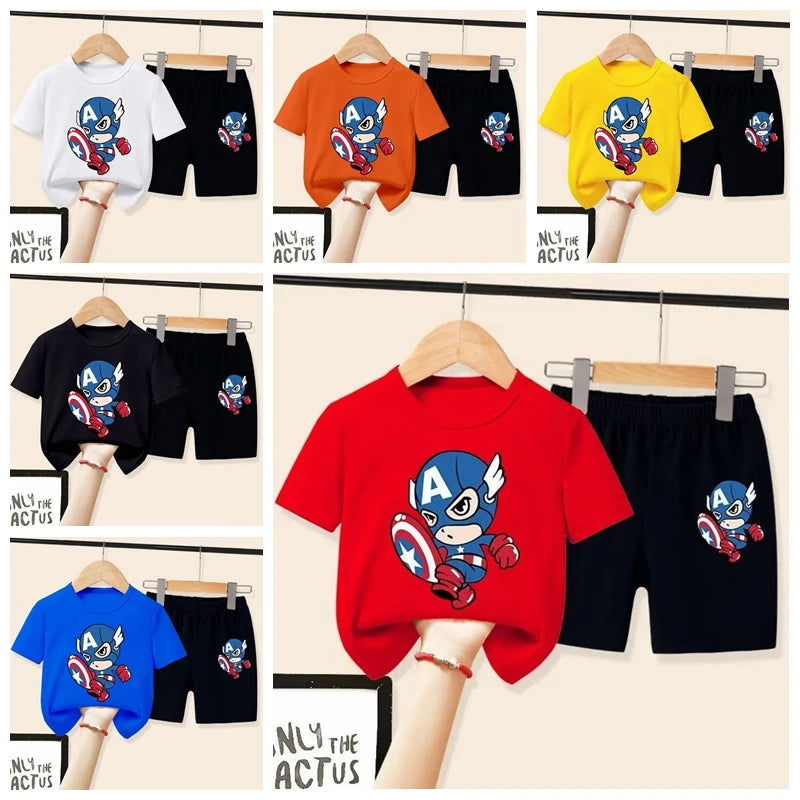 Collage of children's t-shirts and shorts with superhero design on hangers.