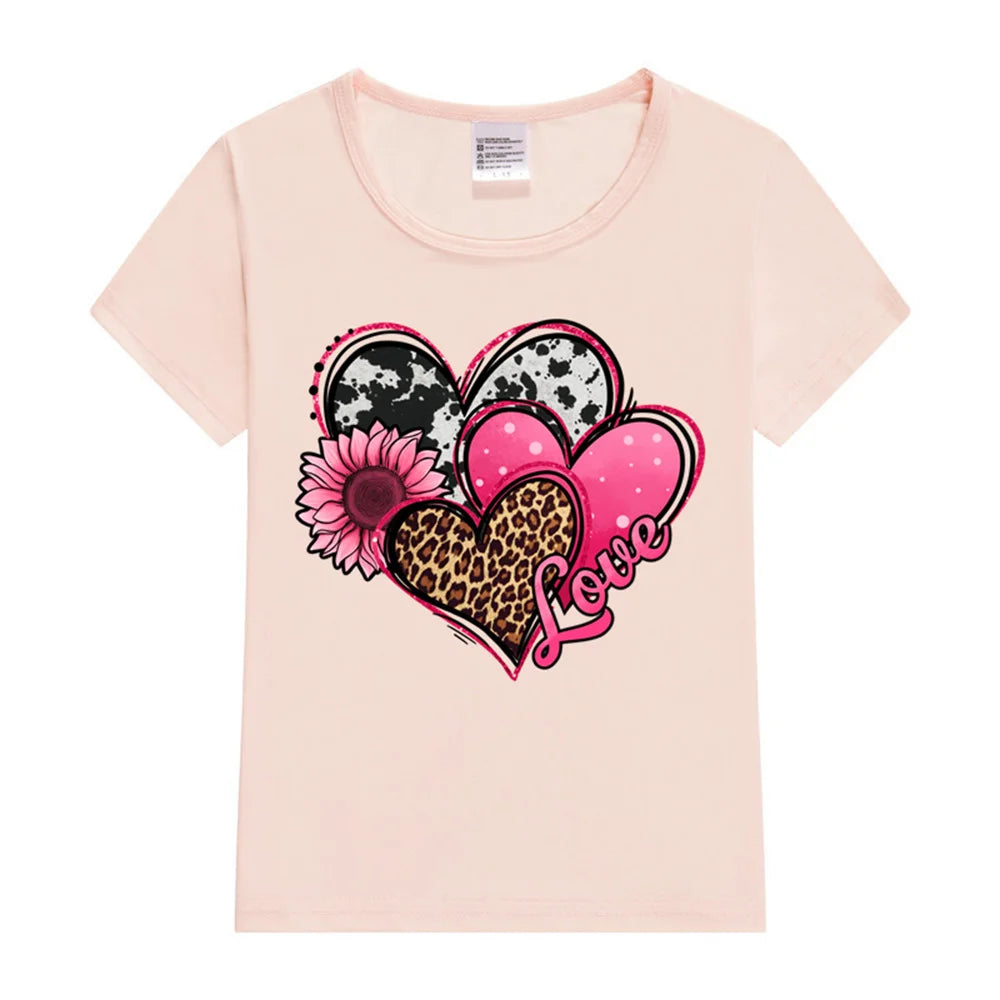 Pink t-shirt with a heart design featuring flowers and leopard print on a white background
