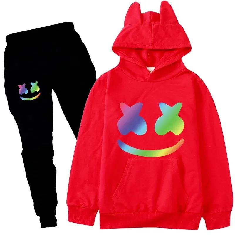 Red hoodie with colorful smiley face design and black pants with rainbow smiley face on a white background