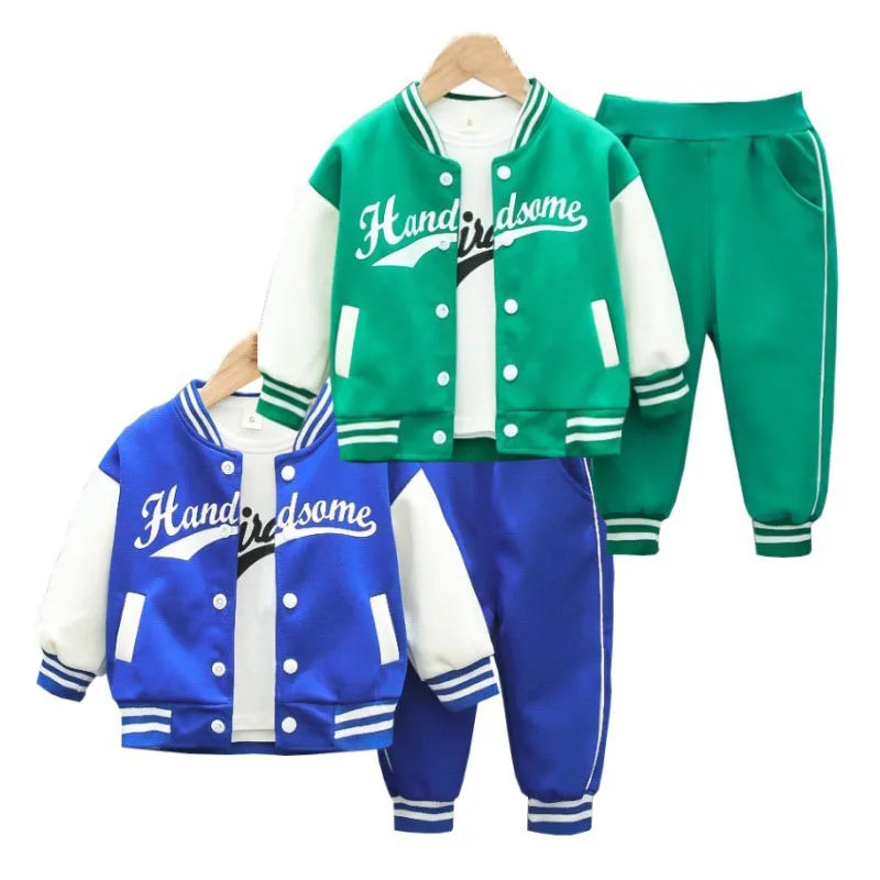 Two children's tracksuit sets in green and blue with 'Handsome' text on a white background.