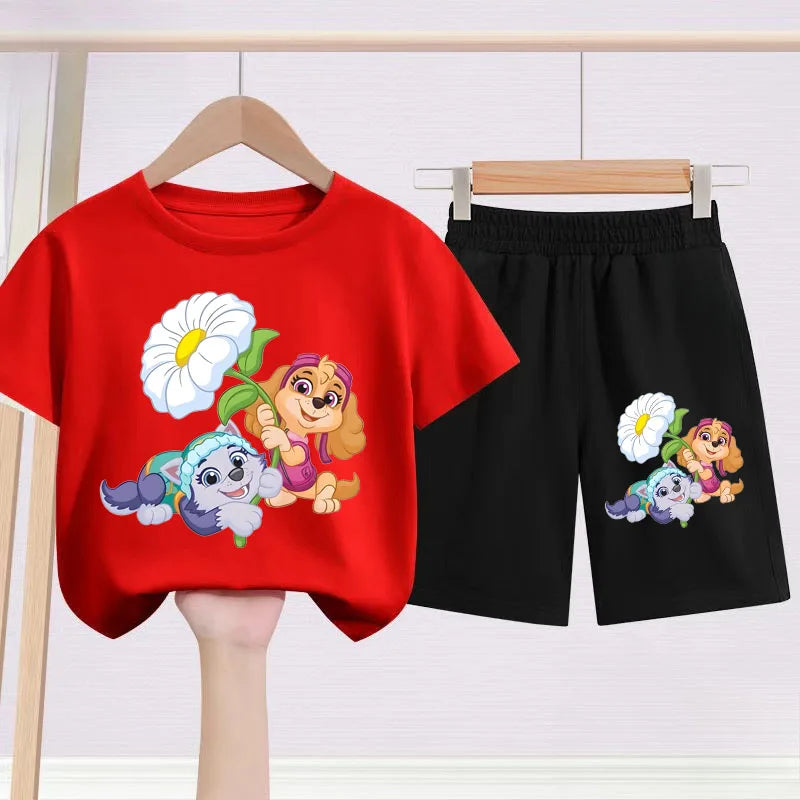 Red t-shirt and black shorts with cartoon characters on hangers against a white background