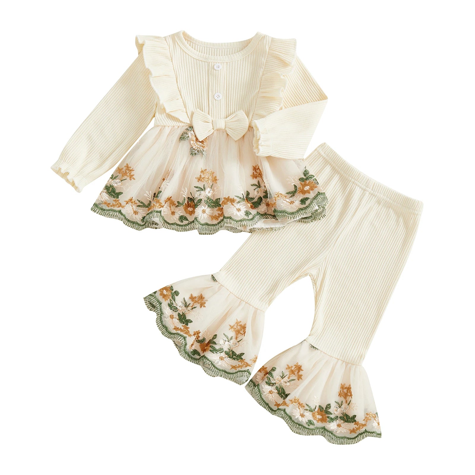 Children's outfit with floral dress and pants on a white background