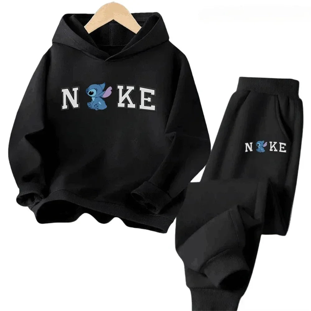 Black hoodie and pants set with 'Nike' logo and character on a white background