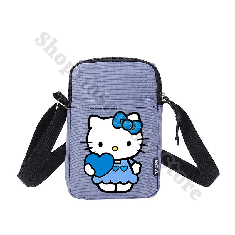 Purple crossbody bag with Hello Kitty design holding a blue heart on a white background