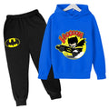 Blue hoodie with cartoon character and black pants with Batman logo on a white background