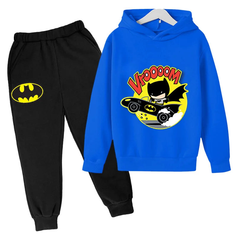 Blue hoodie with cartoon character and black pants with Batman logo on a white background