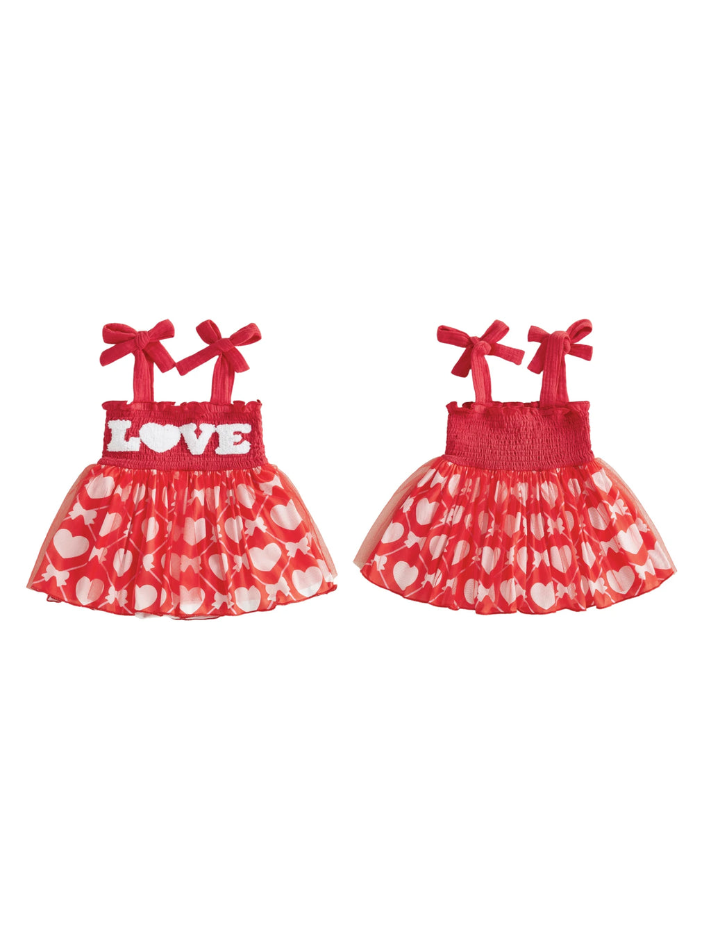 Two red and white children's dresses with heart patterns on a white background