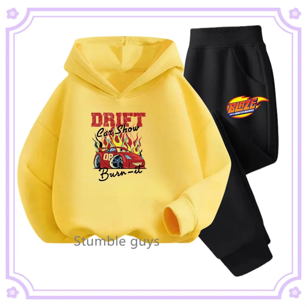 Yellow hoodie with car graphic and black pants on a white background