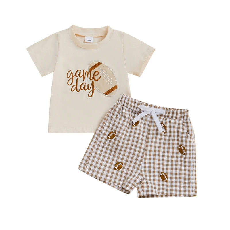 Children's t-shirt and shorts set with 'game day' and football graphic on a white background