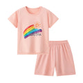 Pink children's t-shirt and shorts set with rainbow and sun design on a white background