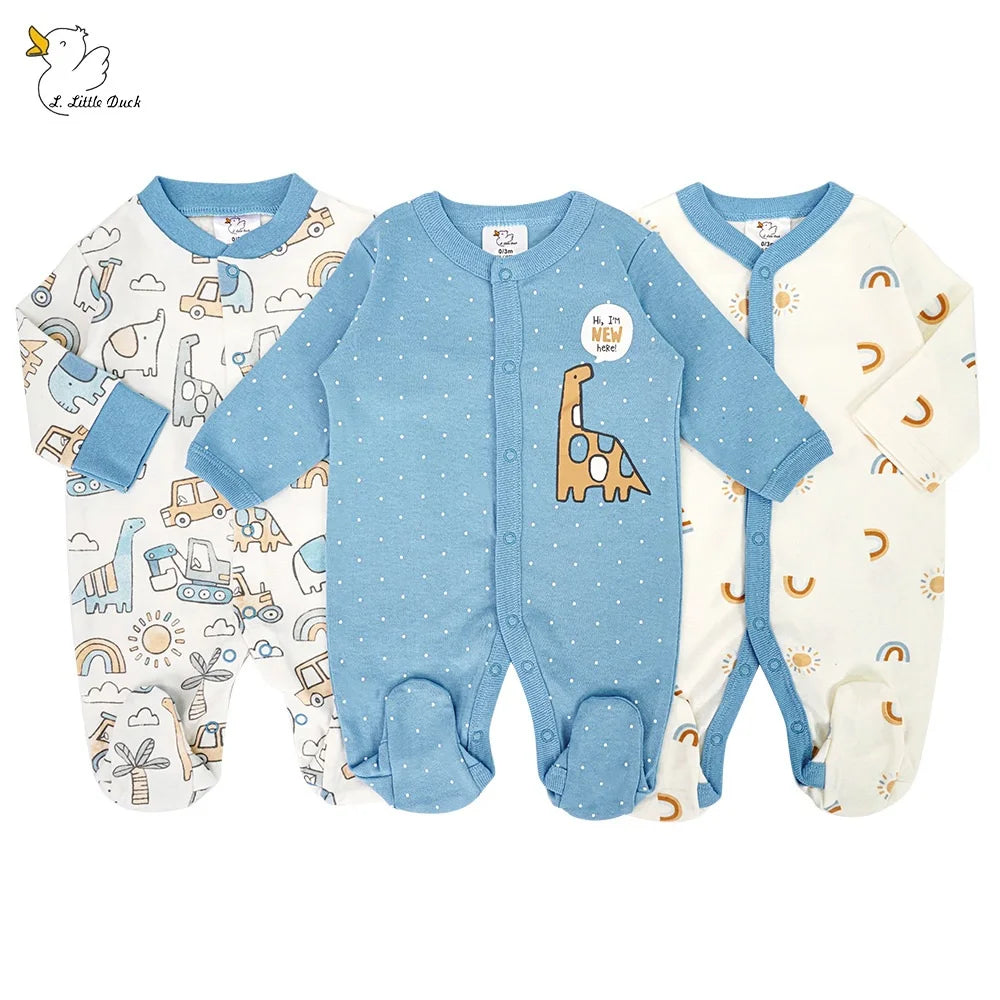 Three baby rompers with different patterns on a white background