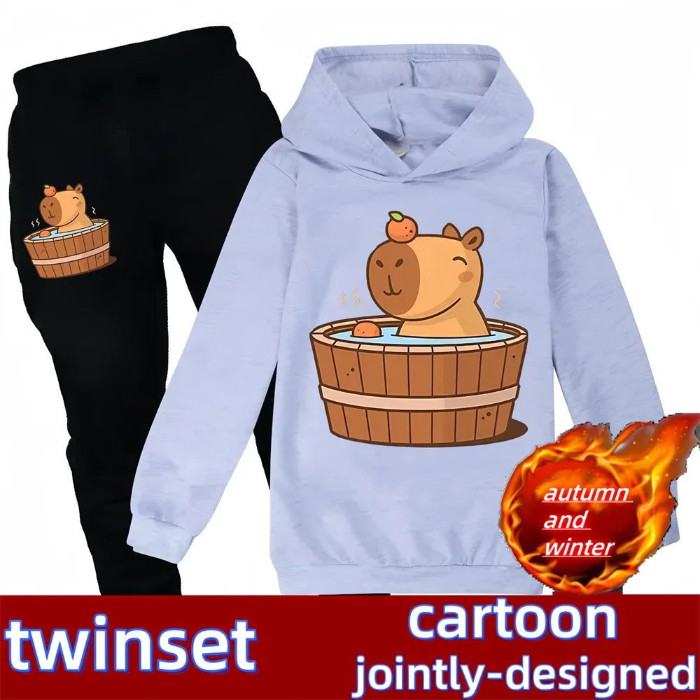 Light blue hoodie with cartoon design of a bear in a hot tub, paired with black pants, on a white background.