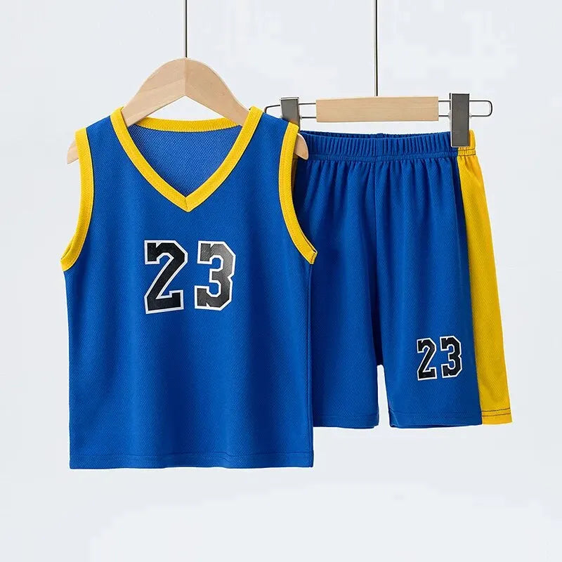Blue basketball jersey and shorts with number 23 on a hanger against a white background