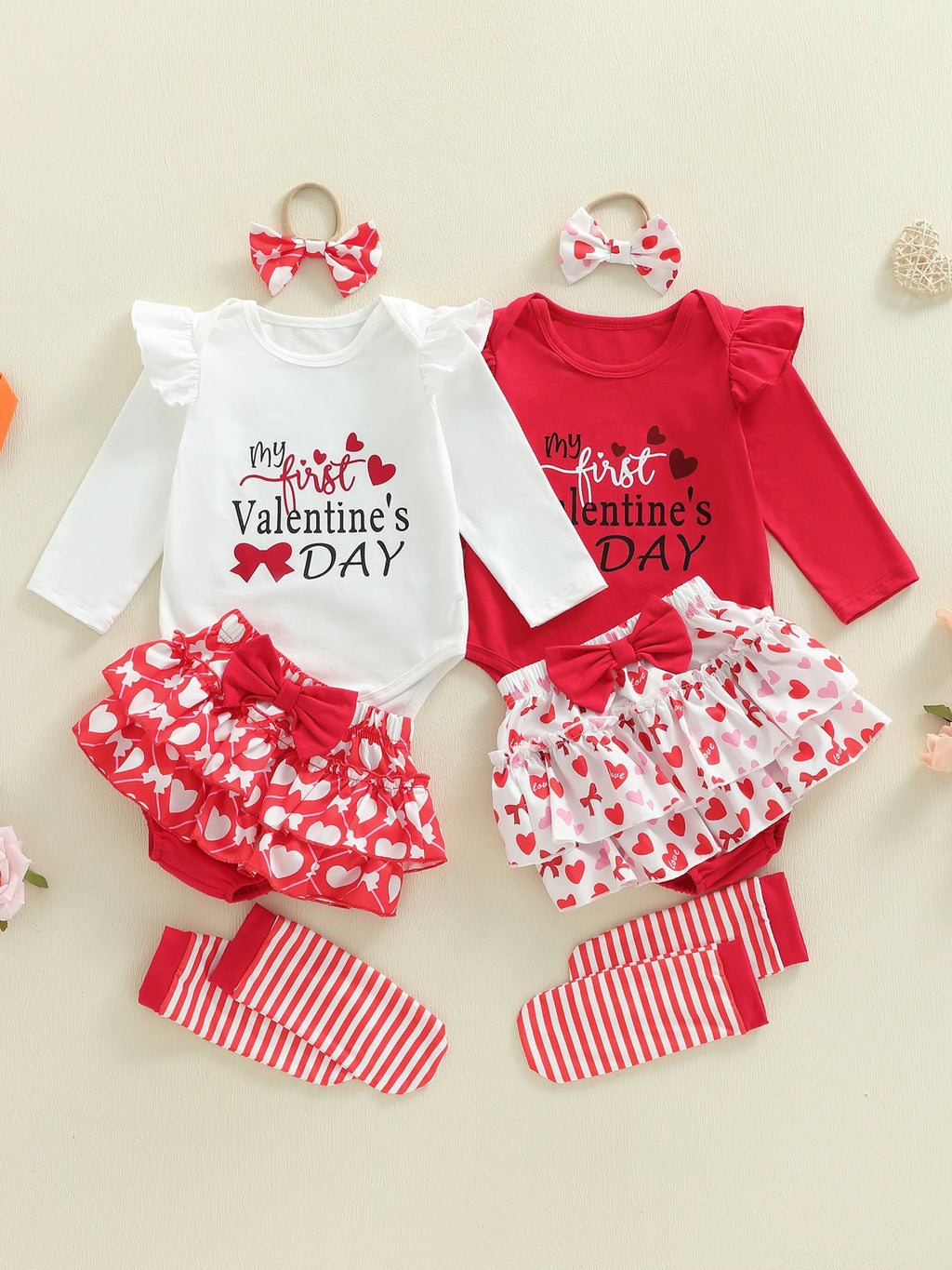 Valentine's Day outfits for a baby girl with matching headbands and socks on a beige background.
