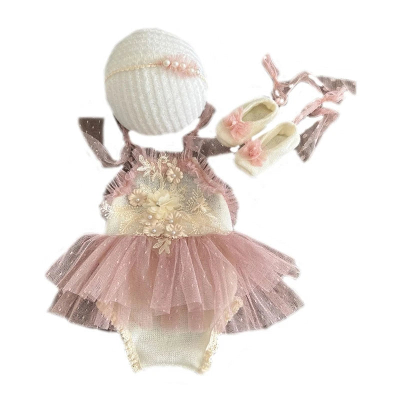 Baby outfit with pink tutu, white headband, and shoes on a white background