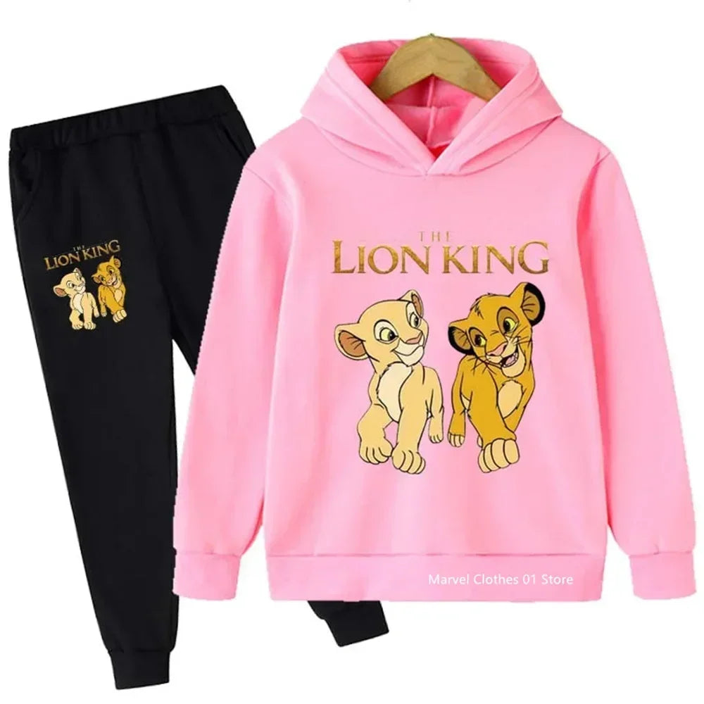 Pink hoodie with 'The Lion King' design and black pants on a white background