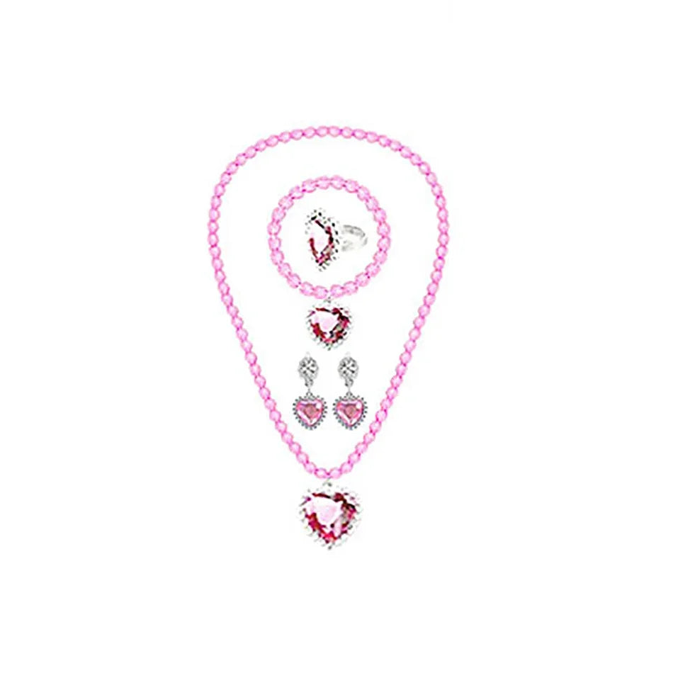 Pink jewelry set with heart-shaped charms on a white background