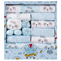 Set of baby clothes with animal designs in a decorative box