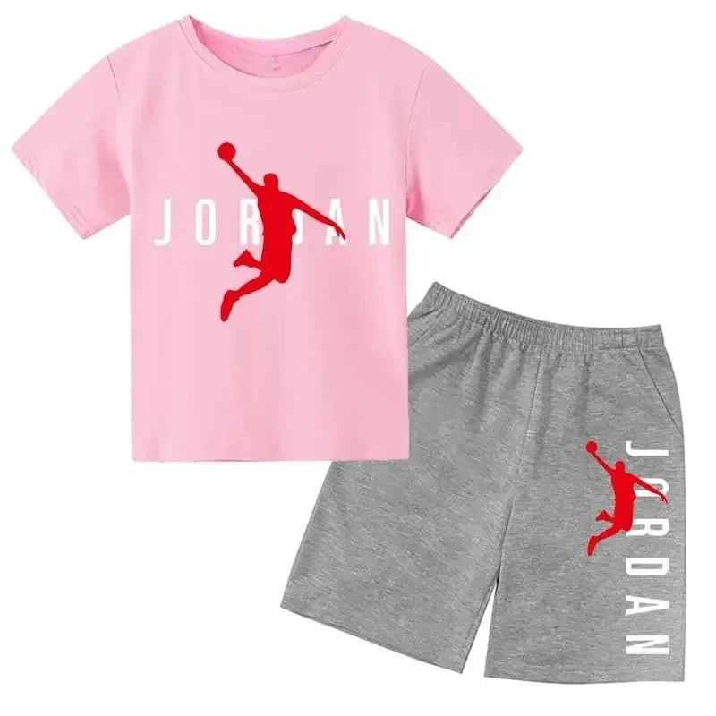 Pink t-shirt and gray shorts set with 'Jordan' logo on a white background
