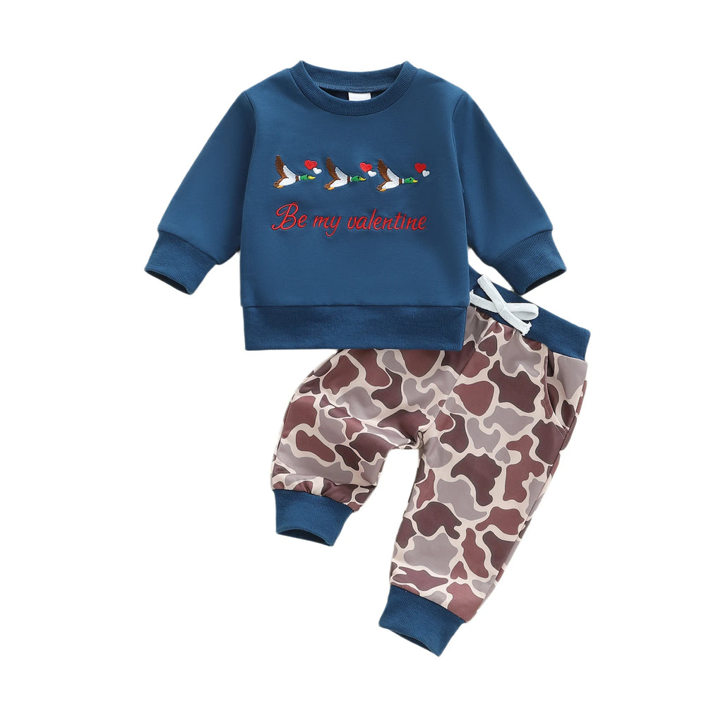 Children's blue sweatshirt with 'Be my valentine' text and camouflage pants on a white background